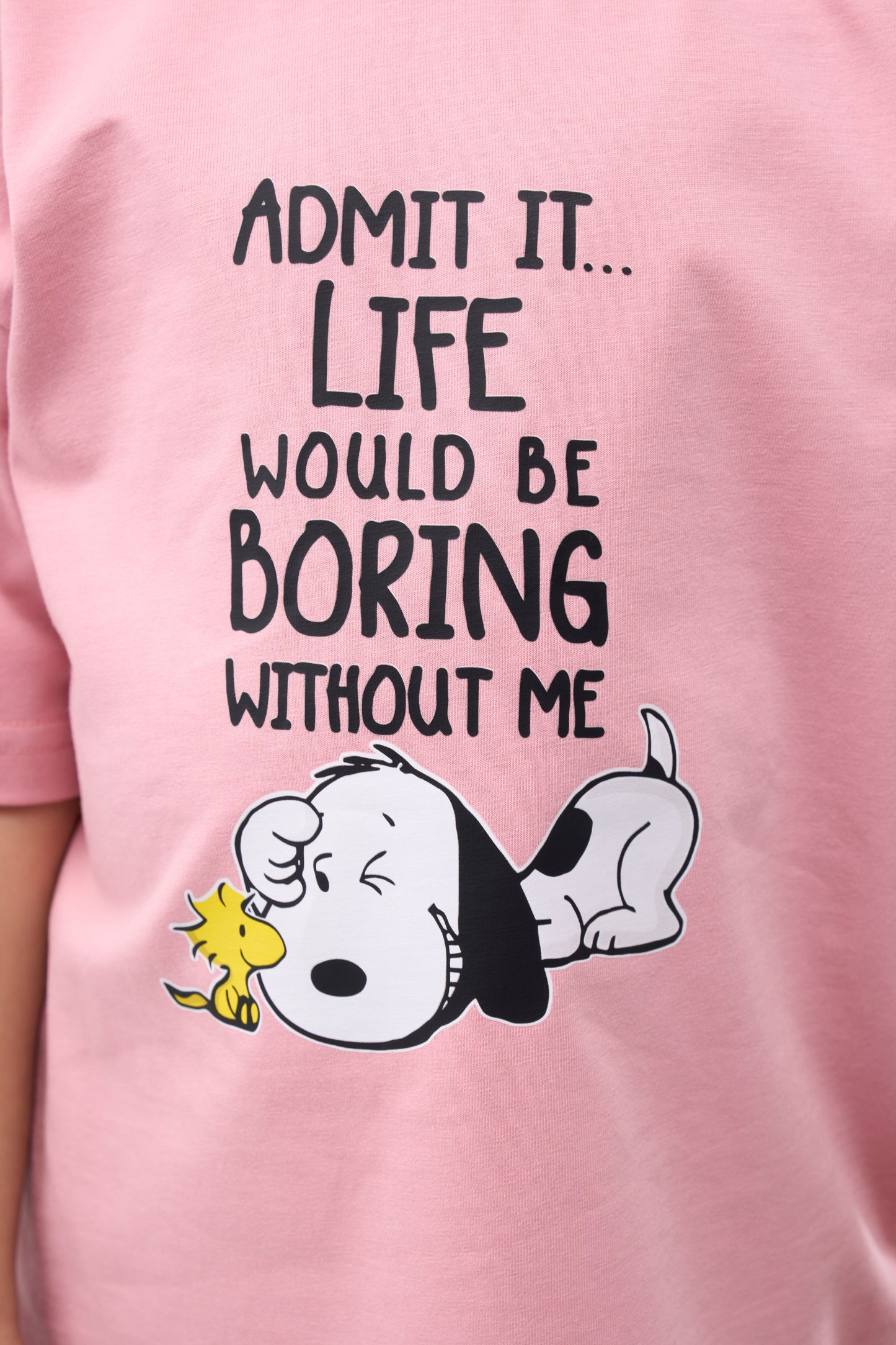 Cashmere Pink T-Shirt with Snoopy and Woodstock graphic and text 'Admit it... Life would be boring without me'.