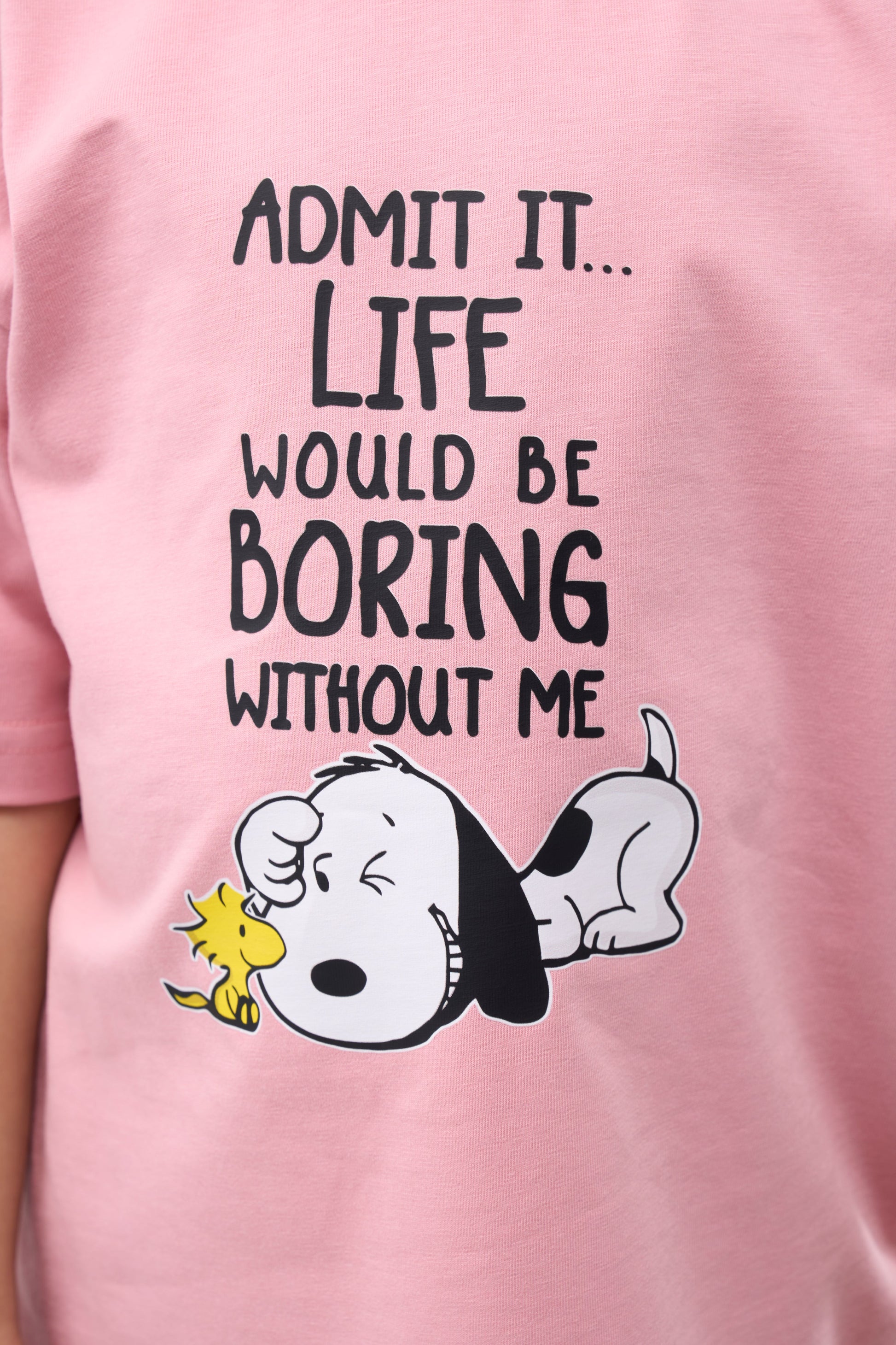 Cashmere Pink T-Shirt with Snoopy and Woodstock graphic and text 'Admit it... Life would be boring without me'.